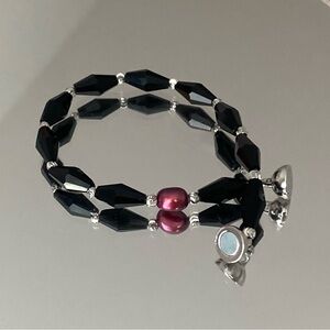 Elegant Black Bead Bracelet with Red Pearl Accent